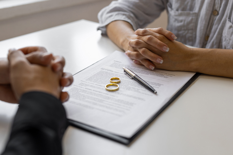 divorce papers between two people